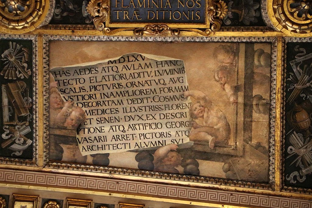 Putti con rotolo e iscrizione - Salone dei Cinquecento